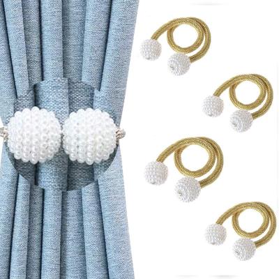 Magnetic curtain tieback